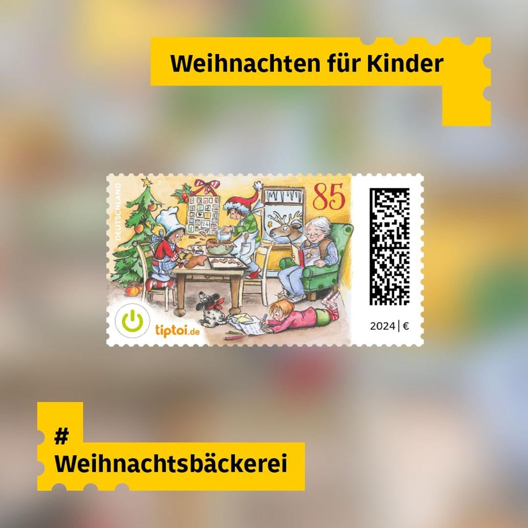 Weihnachtsbriefmarke mit buntem Motiv einer Weihnachtsbäckerei für Kinder. In der Mitte eine fröhliche, winterliche Szene mit Figuren und Gebäuden.